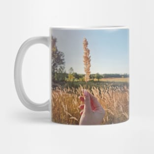 holding a foxtail Mug